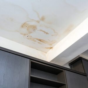 Roof leakage, water dameged ceiling roof and stain on ceiling close-up